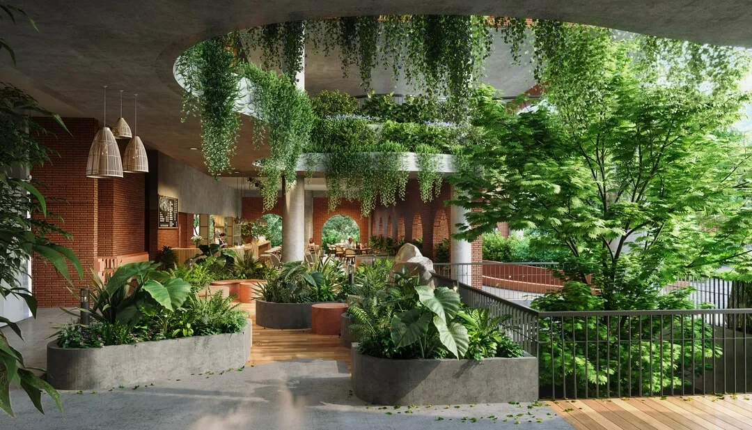 Lush green courtyard with brick walls and tropical plants at Amanvana